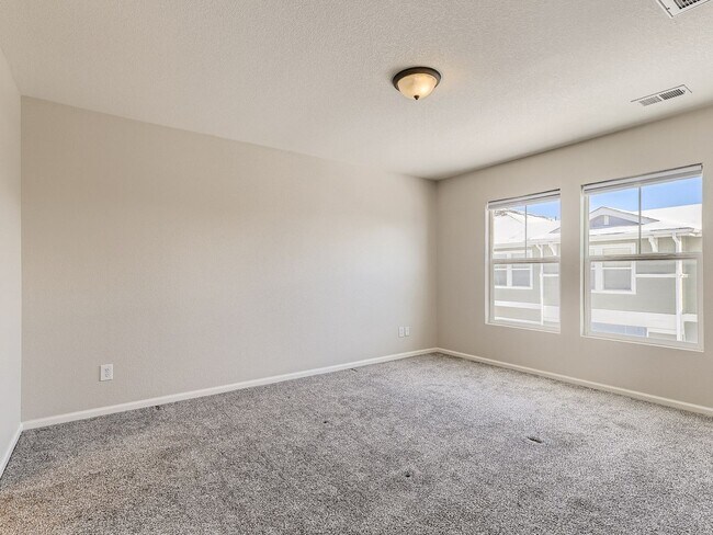 Building Photo - Evolve Real Estate: Spacious 2 Bed 2 Bath Condo with Attached Garage in Parker!