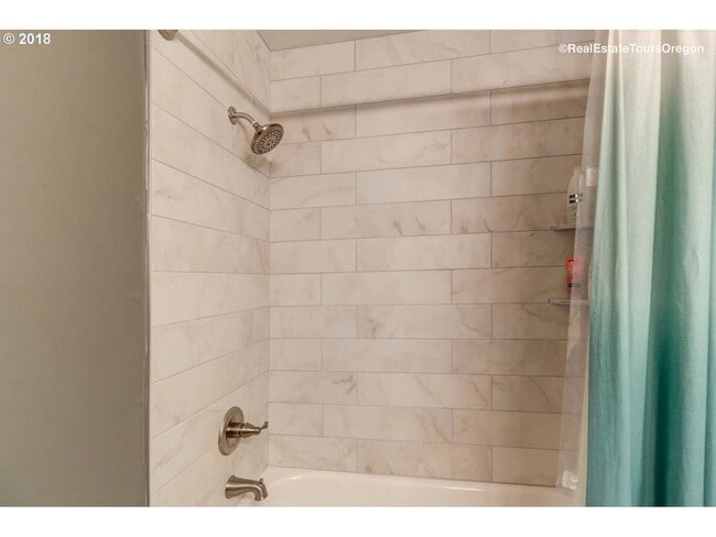 Building Photo - Spacious 4-Bedroom Home with Multiple Livi...