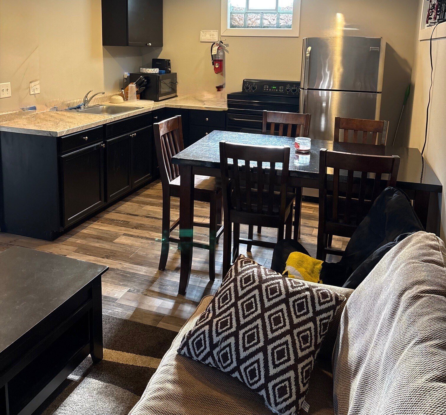 Lower Level Kitchen #2 and Living Room - 825 N Dodge St