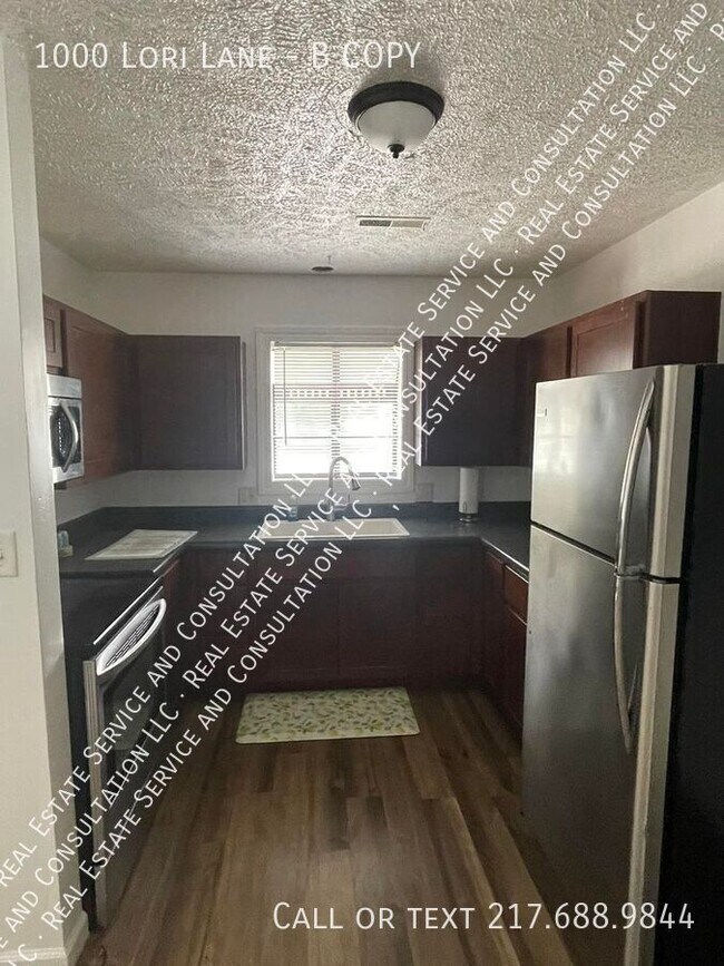 Building Photo - 1000 Lori Ln