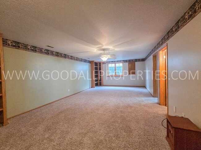 Building Photo - Spacious 5-Bedroom Ranch in the Heart of Waukee with a fenced in yard