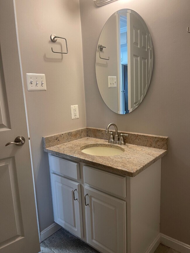 Powder Room - 7897 W End Dr