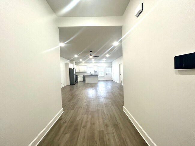 Building Photo - Centerton Home Available NOW! 4 bed, 2 full bath no carpet home. LARGE fenced backyard