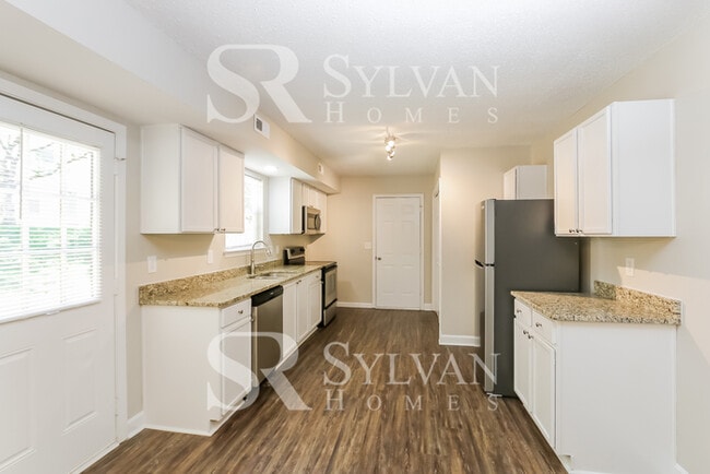 Building Photo - Come view this charming home