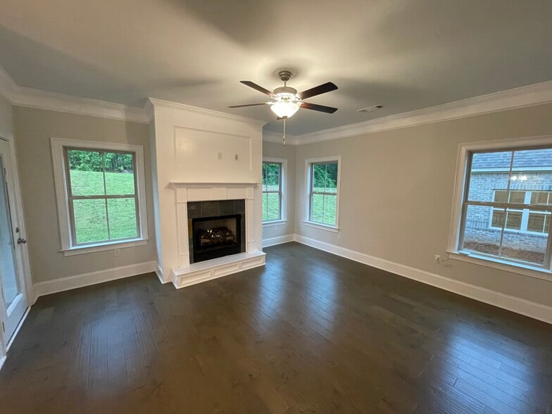 Open floor plan to living room with Fireplace - 303 Charleston Mills Dr