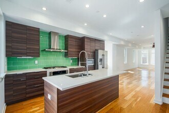 Building Photo - Stunning 4-Bedroom Townhouse with Garage and Rooftop Deck! Available late May!