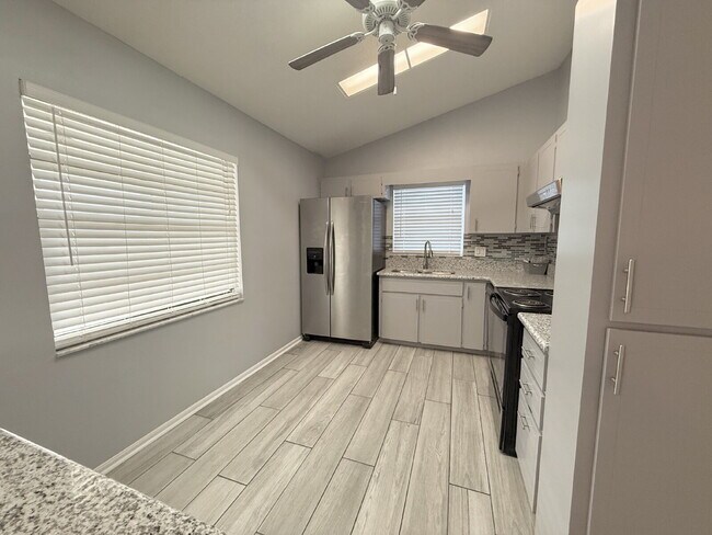 Building Photo - 8023 Wooden Dr