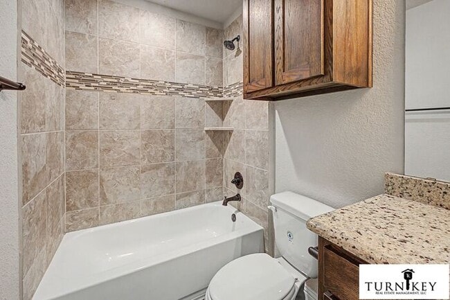 Building Photo - COMING SOON! 3BD/2BA Energy-Efficient Duplex | Granite | Island Kitchen | Garage | Yard Care Incl...