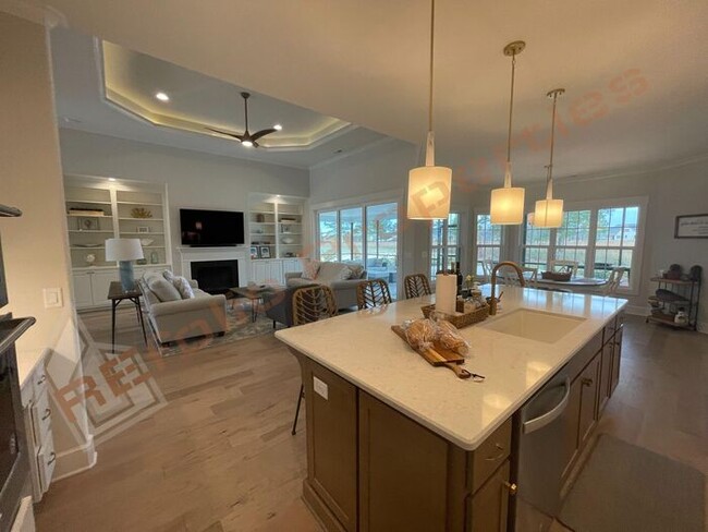 Building Photo - Stunning 4-Bedroom, 4.5-Bath Home with Pri...