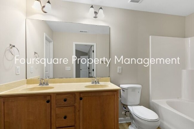 Building Photo - Cozy Townhome with Fireplace, Private Back Patio,  Near US-1, I-540 & Shopping