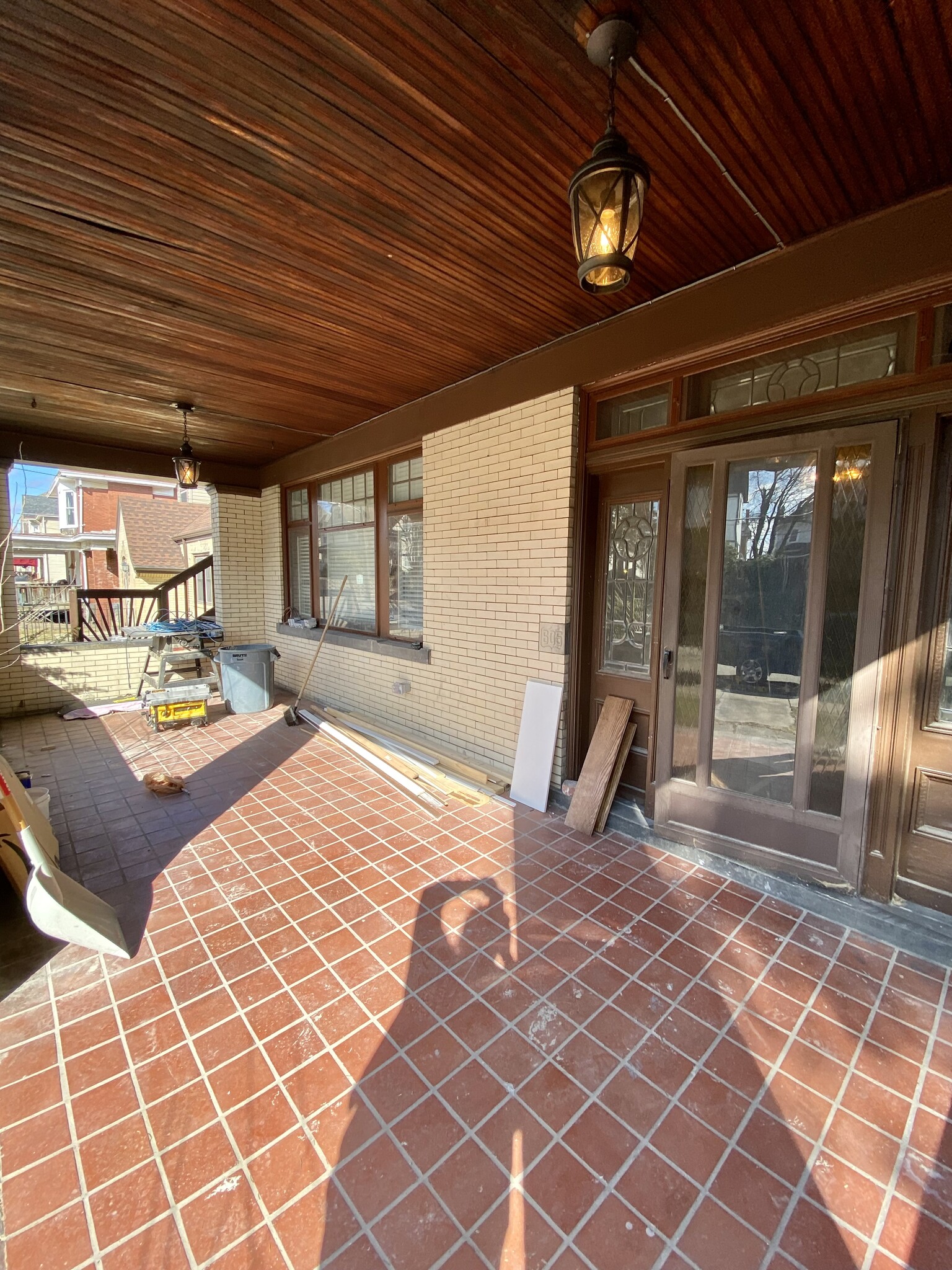 Front porch area. Front entrance to both apartments. - 605 Beechwood Ave