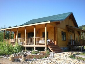 Building Photo - Custom chalet located in an exclusive neighborhood at the base of Teton Pass