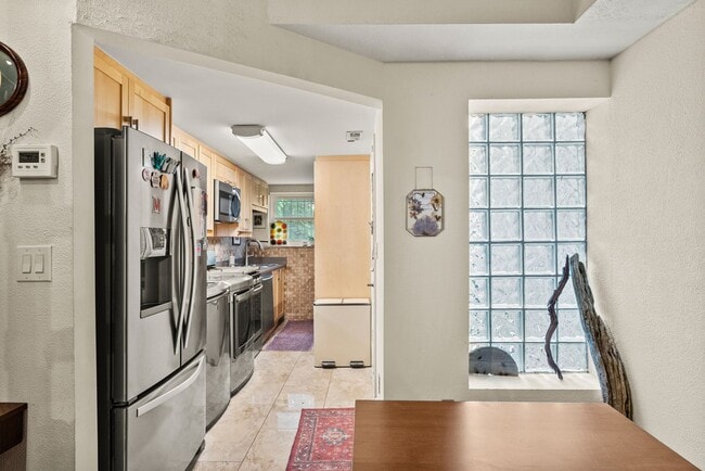 Building Photo - Charming Row Home | 2 Bed | 1 Bath | 950 Sf | Fenced Backyard | 2 Surface Parking Spaces
