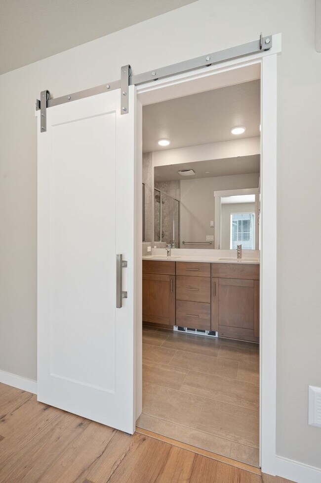 Building Photo - NEW CONSTRUCTION – Stylish 4-Bedroom Townh...