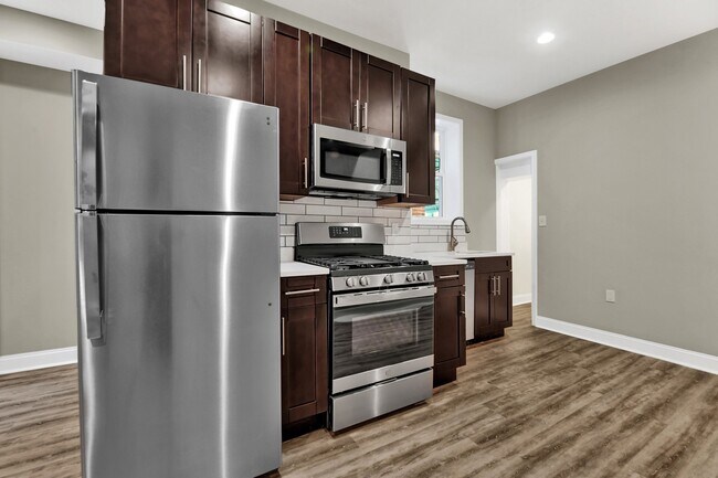 Building Photo - Fully Renovated 3 Bedroom Rowhome- Baltimo...