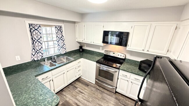 Building Photo - Timeless Charm Meets Modern Living — A 2BD/2BA Casselberry Gem You’ll Fall In Love With! WASHER &...