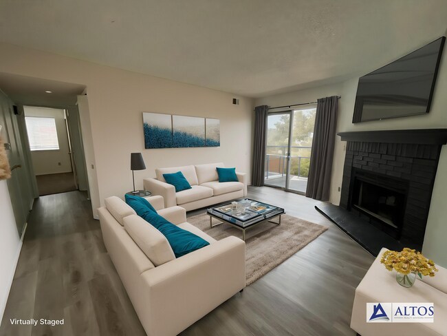 Building Photo - GORGEOUSLY REMODELED 2 bed 2 bath on 3rd floor with vaulted ceiling and skylight and in unit W/D!!