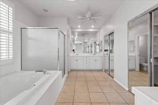 Building Photo - Expansive 4 Bedroom Home with a Pool and L...