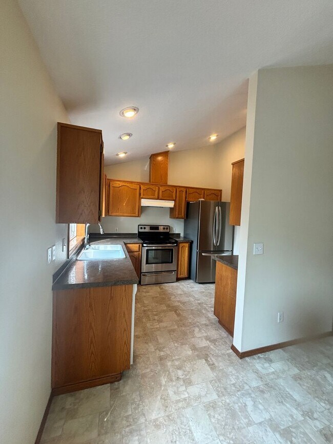 Building Photo - Spacious Tri-Level On Corner Lot