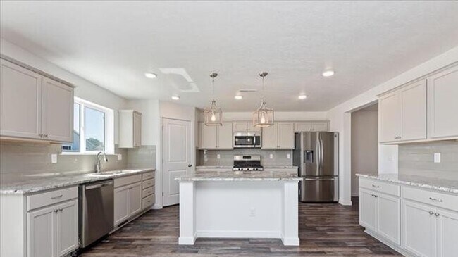 Building Photo - Welcome to this spacious 4 bedroom, 3 bathroom home located in Caldwell, ID.