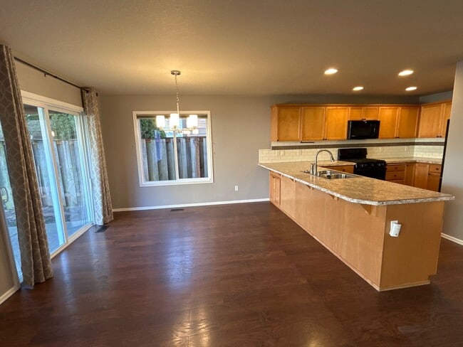 Building Photo - Bright 4-Bedroom Home with A/C, Office & Access to Vibrant Community Amenities Near Riverbend Park