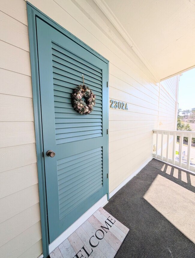Building Photo - Dreamy Little River Condo — Furnished, Elevator Access, Pool & Marina Nearby!