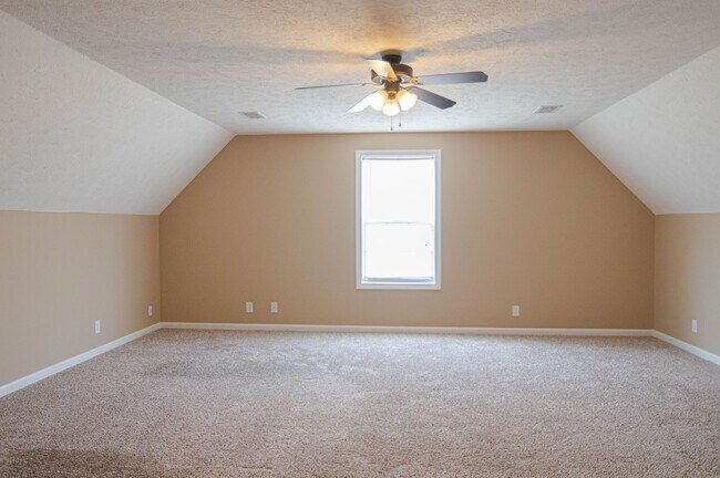 Building Photo - Pet Friendly Three Bedroom with Bonus!