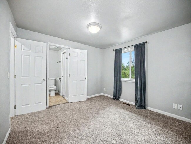 Building Photo - Spacious 4-Bedroom Lacey Home with A/C, Basement Bonus Space & Wetlands Privacy