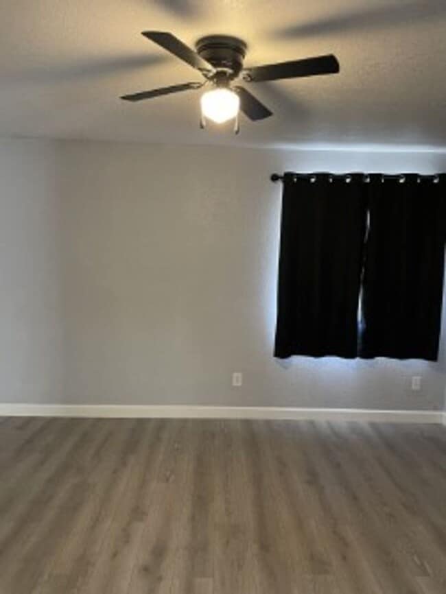 Building Photo - North side home, pet friendly with fenced back yard.