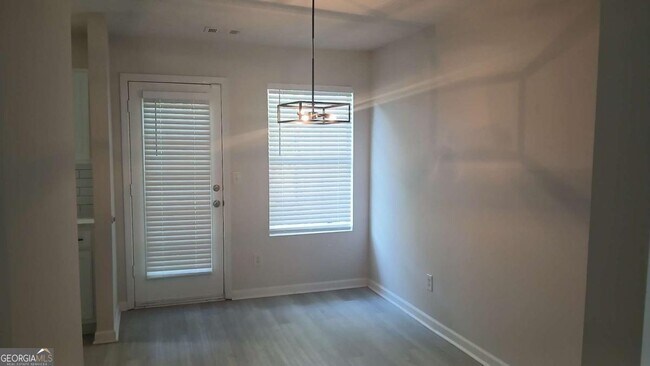 Building Photo - 5677 Wind Gate Ln