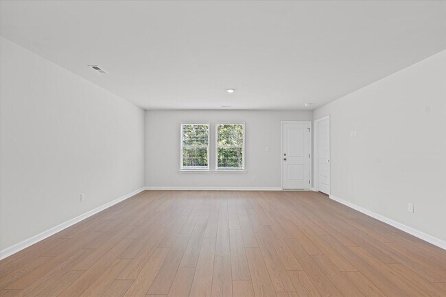 Building Photo - New 4BR Home in Whispering Woods – Spaciou...