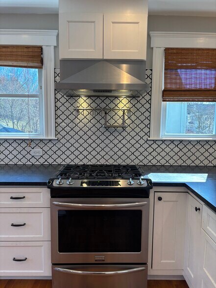 Gas stove with vented hood - 91 Dustin St