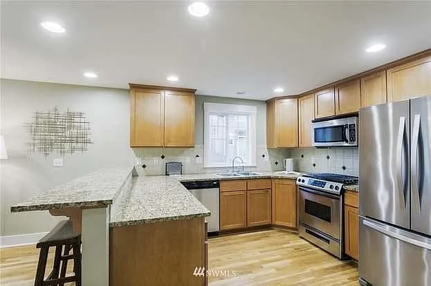 Building Photo - 8403a 8th Ave NW