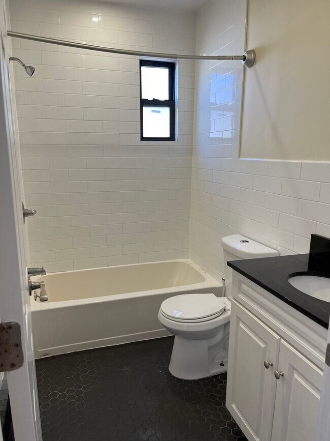 Building Photo - Newly Remodeled Large 3 Bedroom in Quiet 3 Family Home