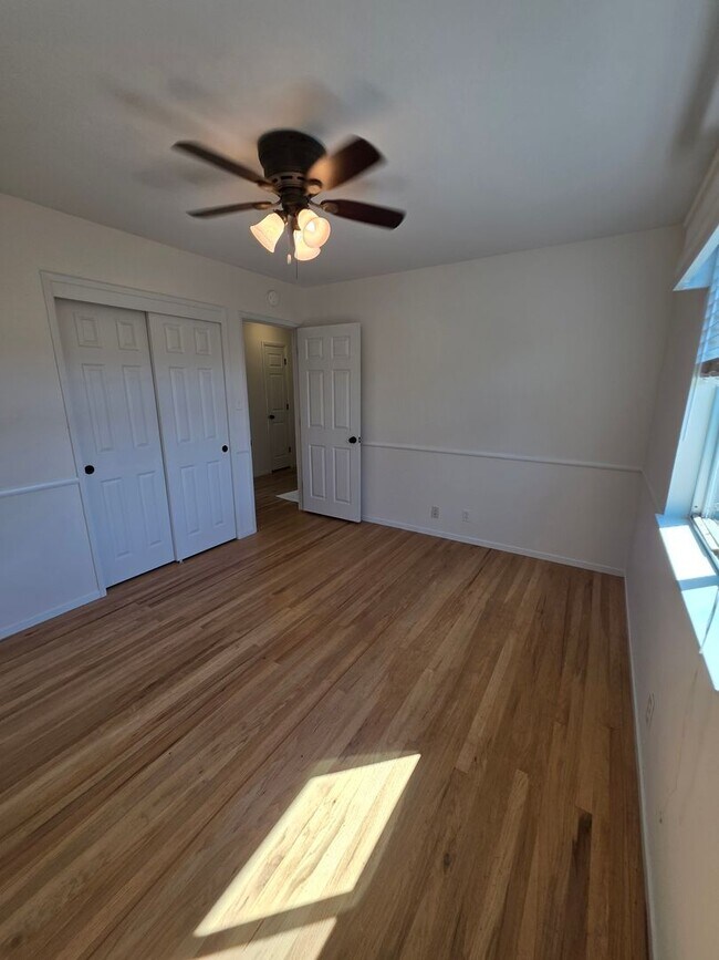 Building Photo - Delightful Single Story 2/2 with Expanded Bath and Beautiful Gardens