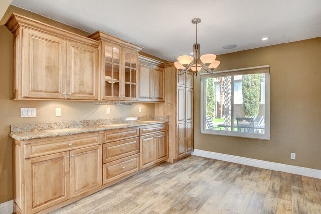 Building Photo - Gorgeous 4 Bedroom, 2 Story Home with a Beautiful Pool in the Lakes!