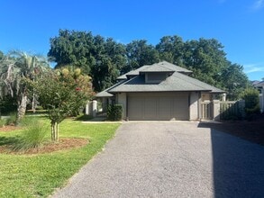 Building Photo - Private Beach Access from this Fully Remod...