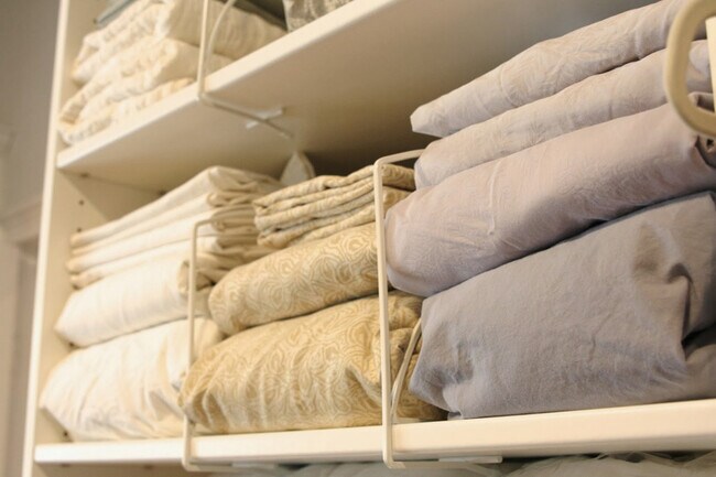 Rest easy on crisp, freshly laundered bed sheets, pillowcases, linens, and blankets - 2304 E 14th St