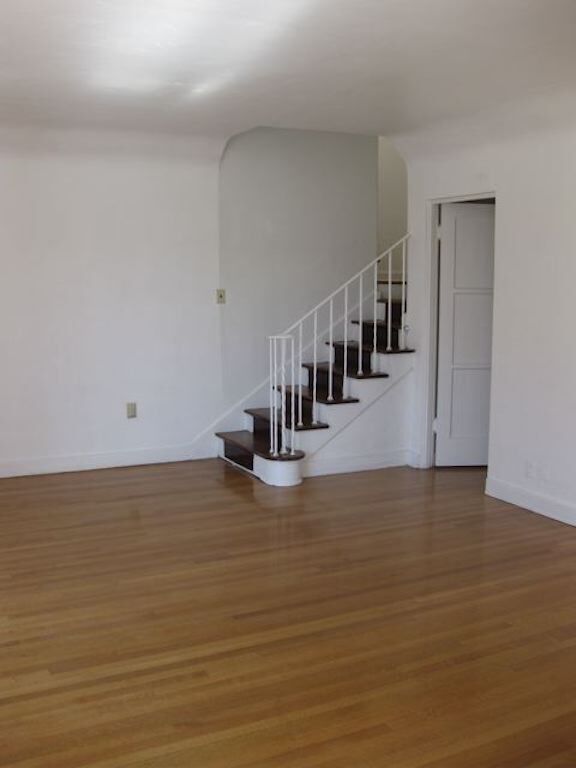 Living room & staircase leading up to 2nd floor - 3438 Field Ave