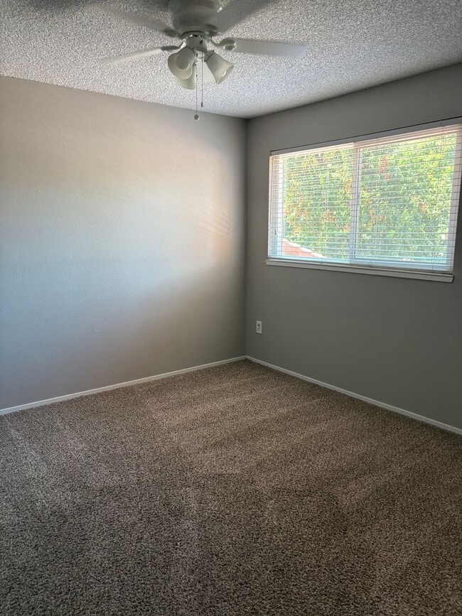 Building Photo - Updated Two Bedroom, 1.5 Bath Condo w/Fire...