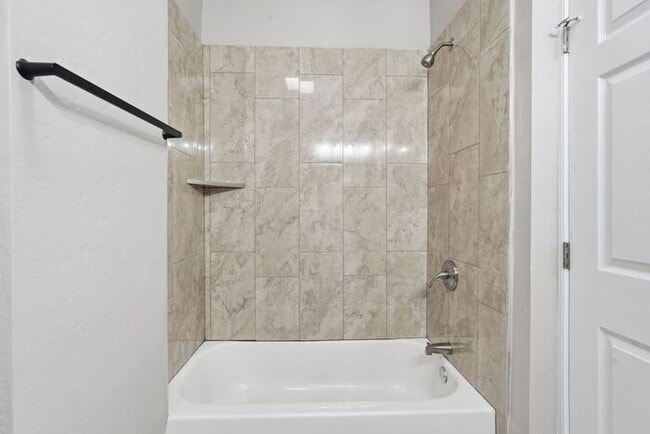 Building Photo - Bright, Fresh & Pet-Friendly — 3BR Retreat Minutes from U of A