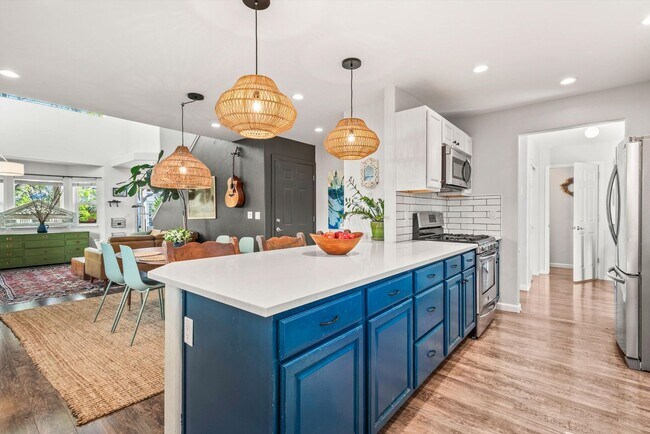 Building Photo - Prime Location | Spacious 4BD Home with El...