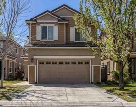 Building Photo - 4 Bedrooms in Gated Community