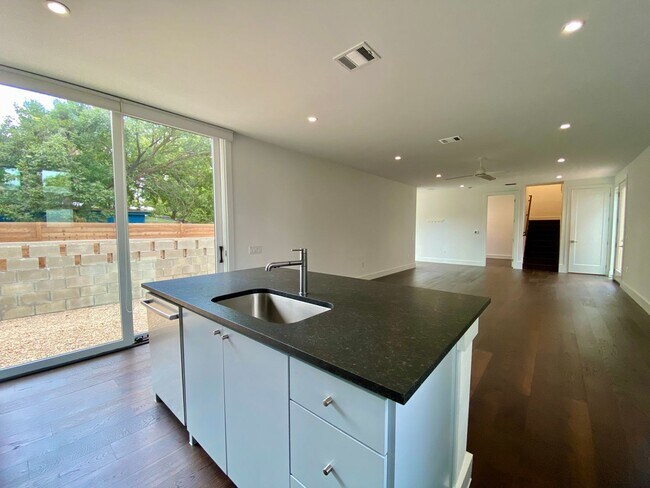 Building Photo - Modern Luxury Near the Lake – Sleek Design...