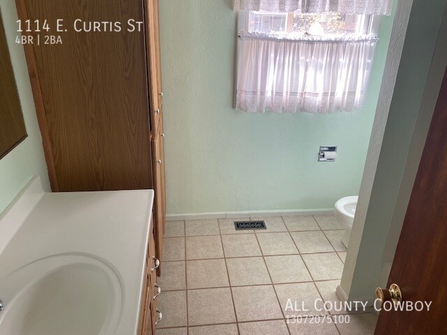 Building Photo - 4 Bed, 2 Bath, 1 Garage