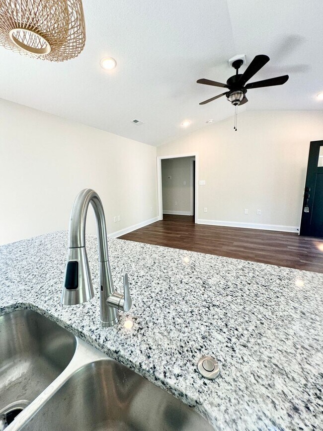 Building Photo - BEAUTIFUL pond front home! All the details make this a showstopper.! Fenced Yard!!