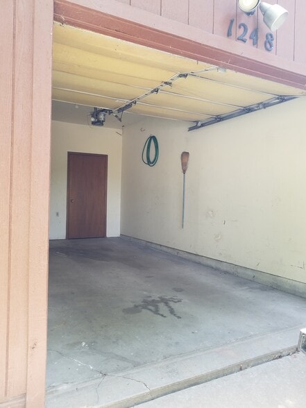 Garage with storage and auto openers - 1248 Dolen Pl