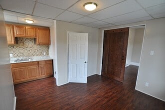 Building Photo - Spacious and Charming Efficiency Apartment...