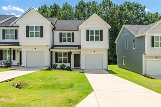 Building Photo - Modern 4 Bedroom Home in Quiet Clayton Nei...