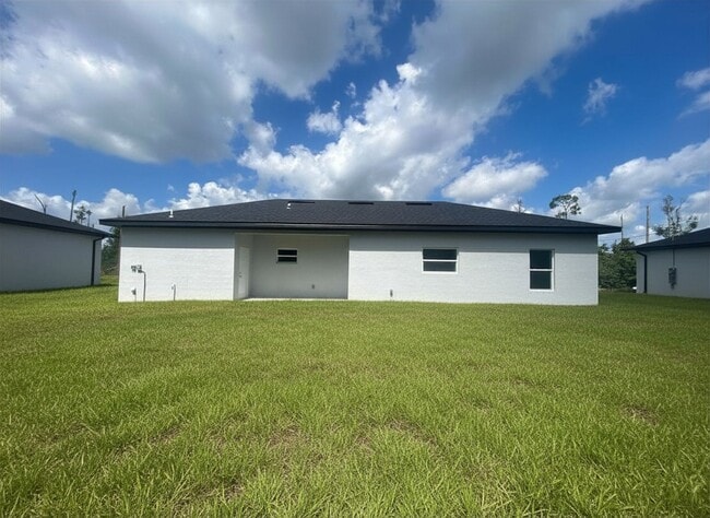 Building Photo - JUST BUILT! Modern 3 Bed / 2 Bath Home with Garage in Serene Lake Placid